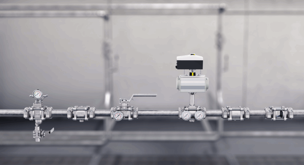 I forgrunn en rørgate med forskjellige ventiler bygd inn