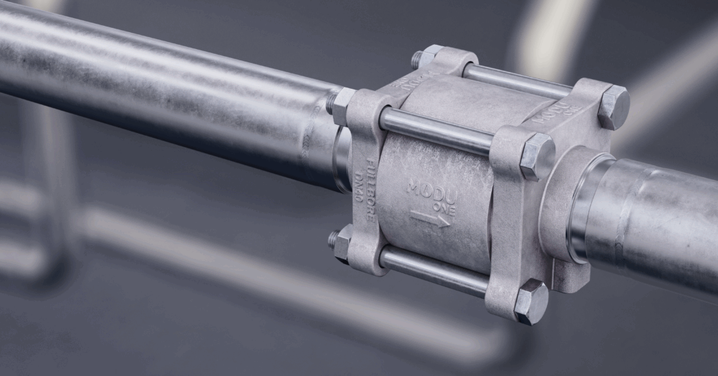 Close-up av en tilbakeslagsventil bygd inn i en rørgate